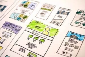 Hand-drawn sketches of multiple landing page layouts representing landing pages designed to convert visitors into website leads.